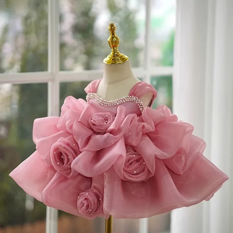 Pink girls beaded formal dress toddler with pearl neckline and large flower appliques