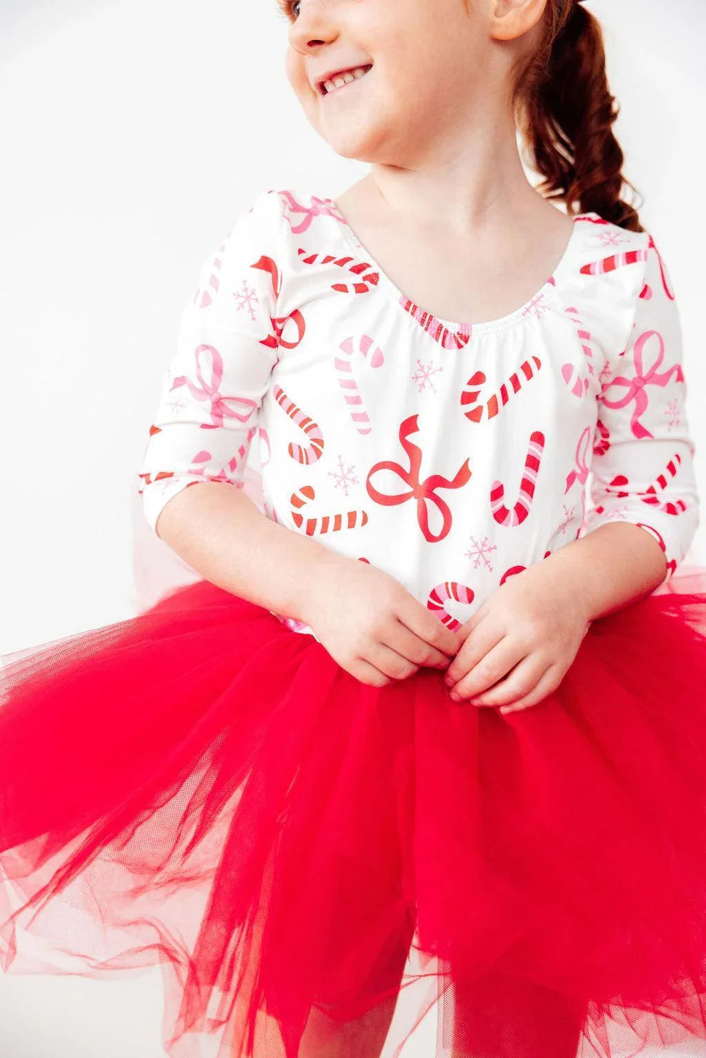 Girls candy cane tutu leotard in white with red candy cane print and red 3/4 tutu skirt for toddlers