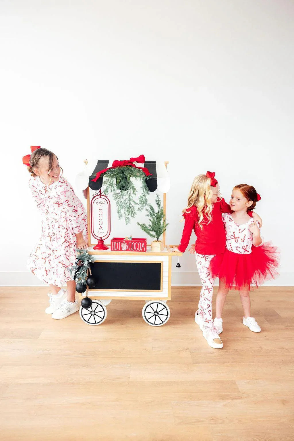 Girls candy cane tutu leotard in red and white with matching red tutu and festive holiday print for young girls