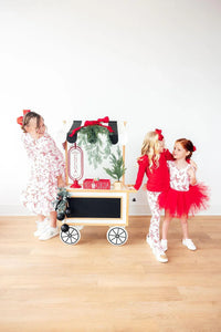 Girls candy cane tutu leotard in red and white with matching red tutu and festive holiday print for young girls