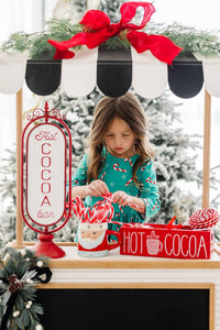 Girls green Mila Rose Christmas candy twirl dress with 3/4 sleeves and candy cane print
