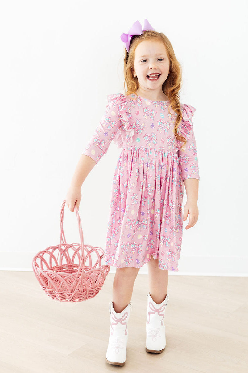 Girls pink floral twirl ruffle dress 3/4 sleeve for toddlers with matching bow and white boots