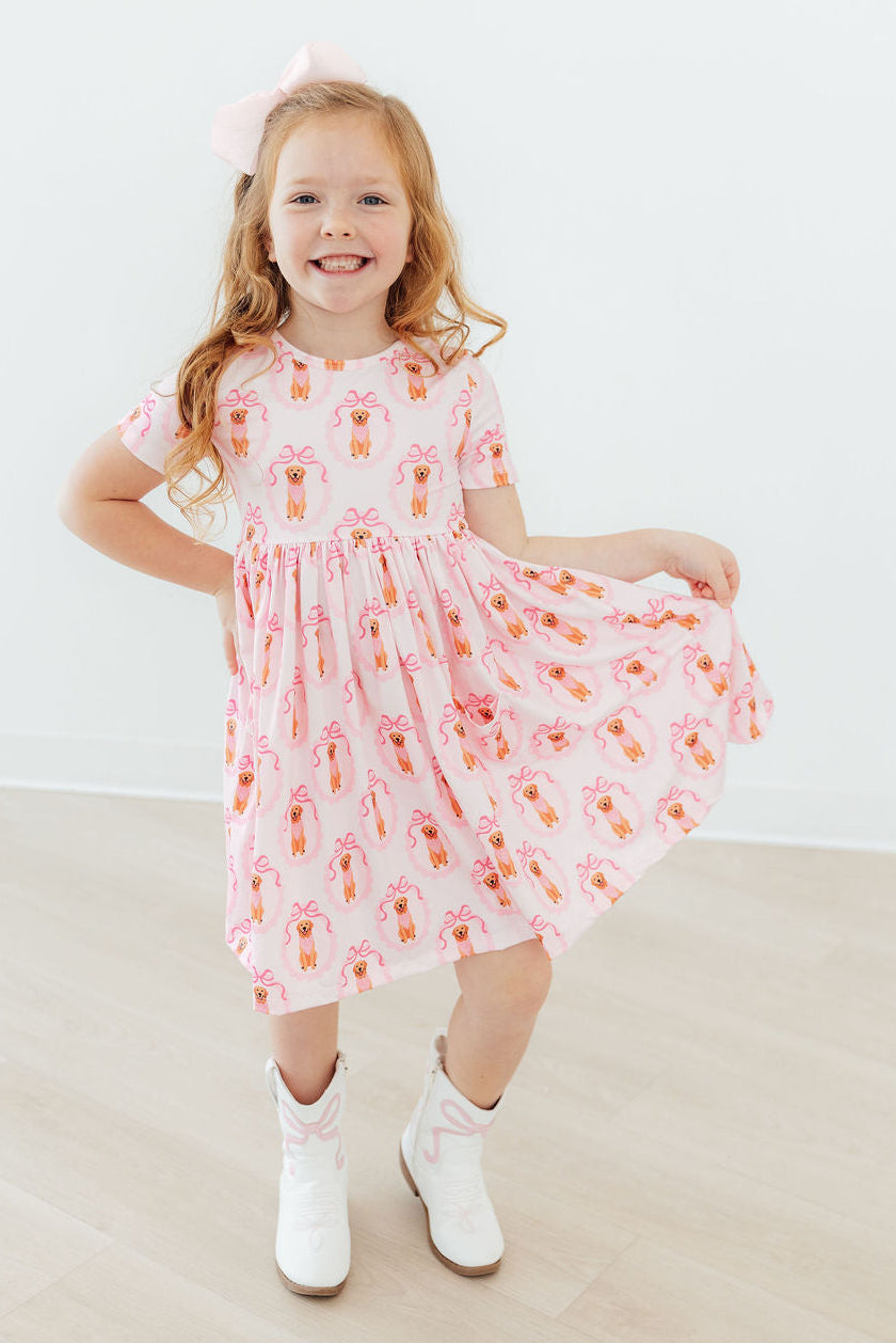 Pink girls dress with short sleeves and twirl pocket design for toddlers 