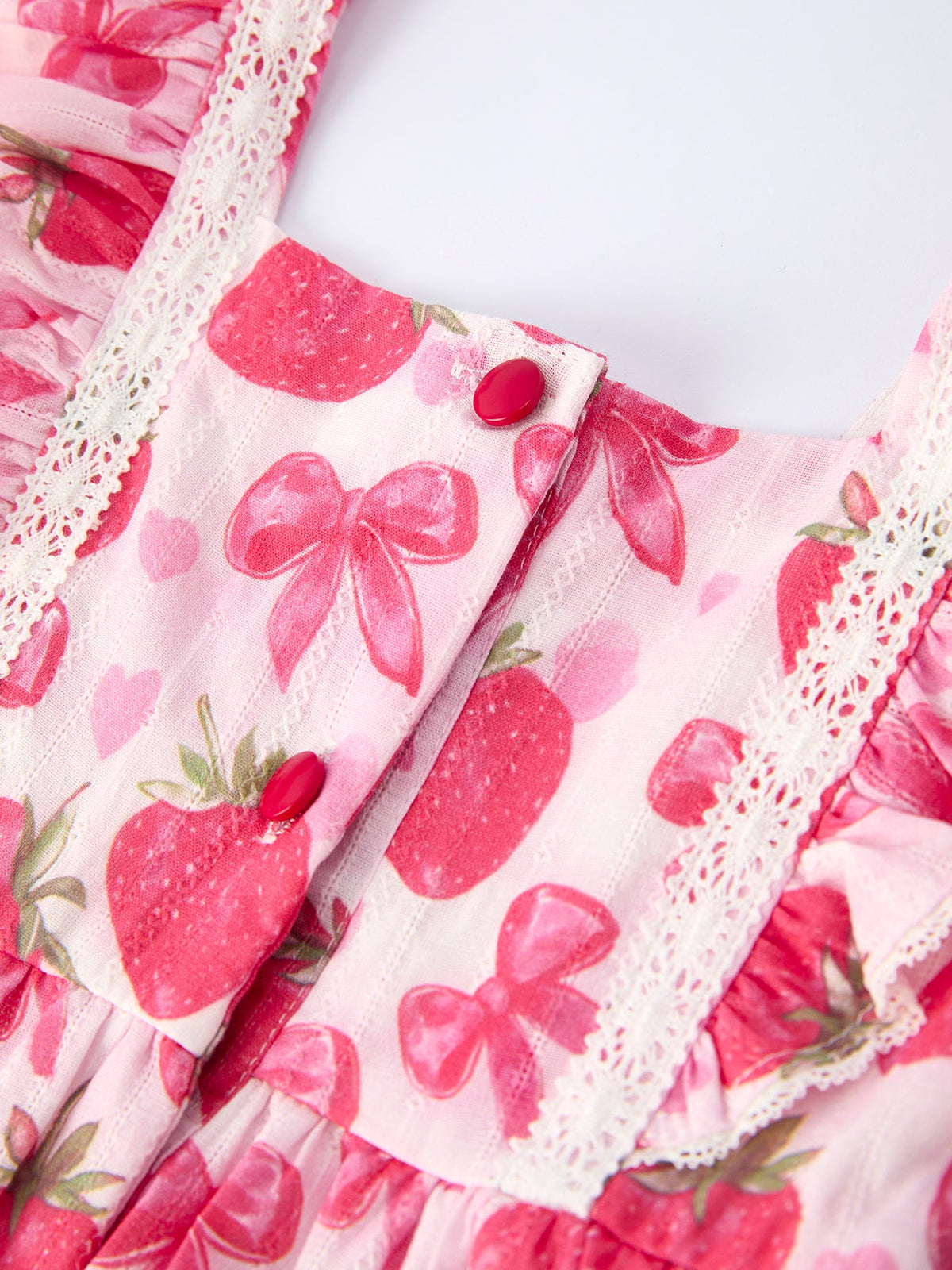 Rylee Faith Designs girls pink strawberry print girls dress with bow and lace trim details
