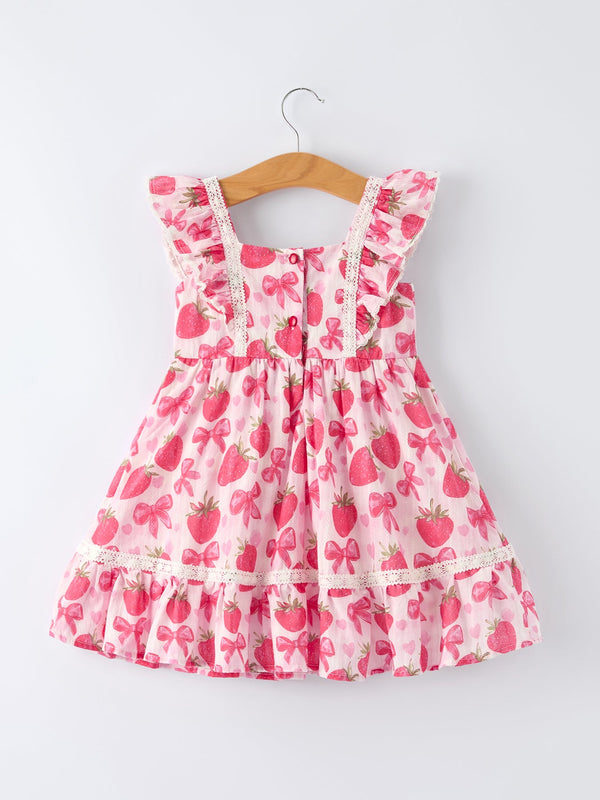Rylee Faith Designs strawberry print girls dress with pink bows and ruffle sleeves for toddlers