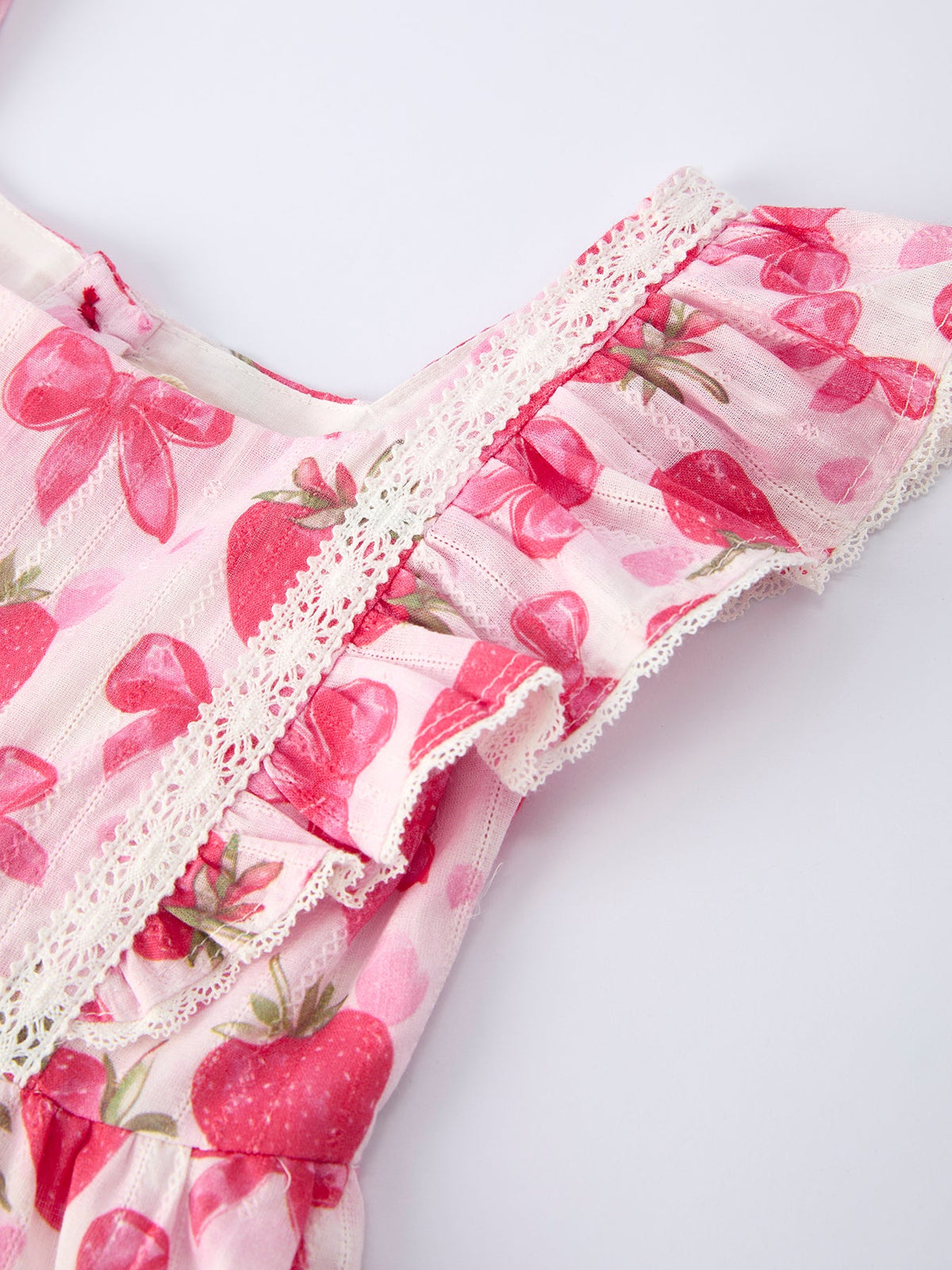 Rylee Faith Designs girls strawberry print dress with pink ruffles and lace trim for toddlers