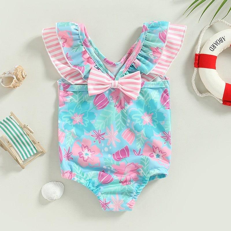 Girls floral one piece swimsuit in blue and pink with ruffled sleeves and striped bow for toddlers
