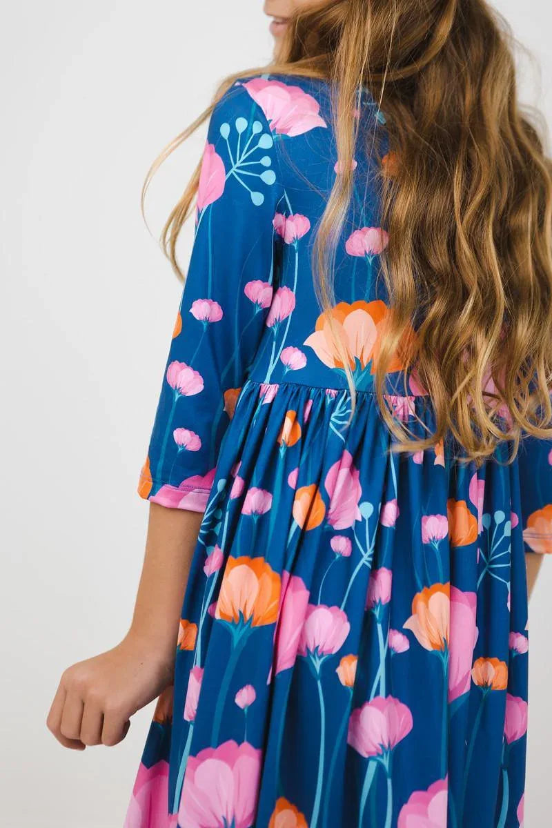 Girls floral twirl dress in blue with pink and orange flowers, sleeves, age 3-4 years