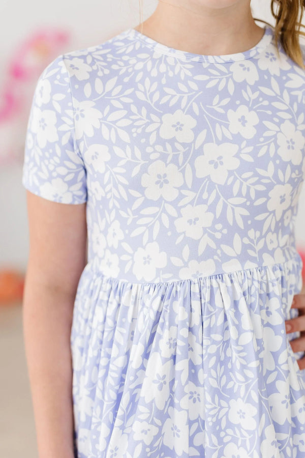 Girls light blue and white floral twirl dress short sleeve pocket detail