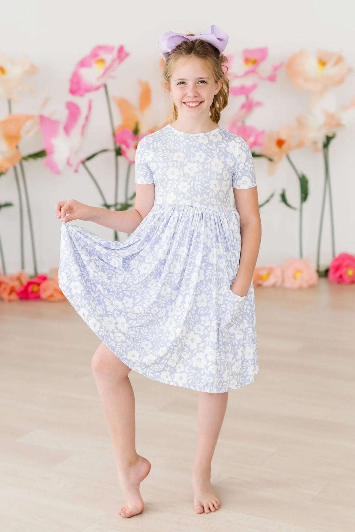 Girls floral twirl dress short sleeve light blue and white for kids with pockets