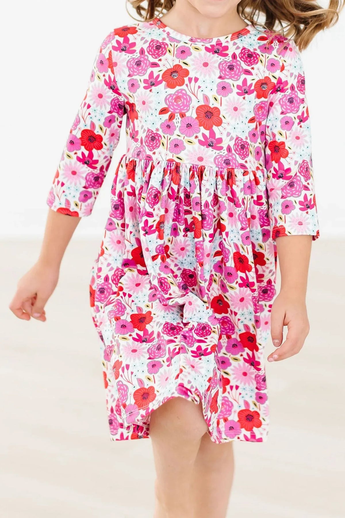 Girls floral twirl dress by Mila & Rose with 3/4 sleeves in white pink red for toddlers