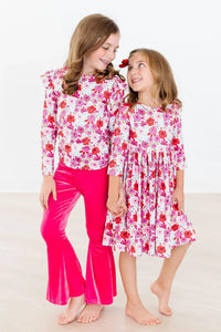 Girls floral twirl dress in white and pink with 3/4 sleeves, toddler size from Mila & Rose