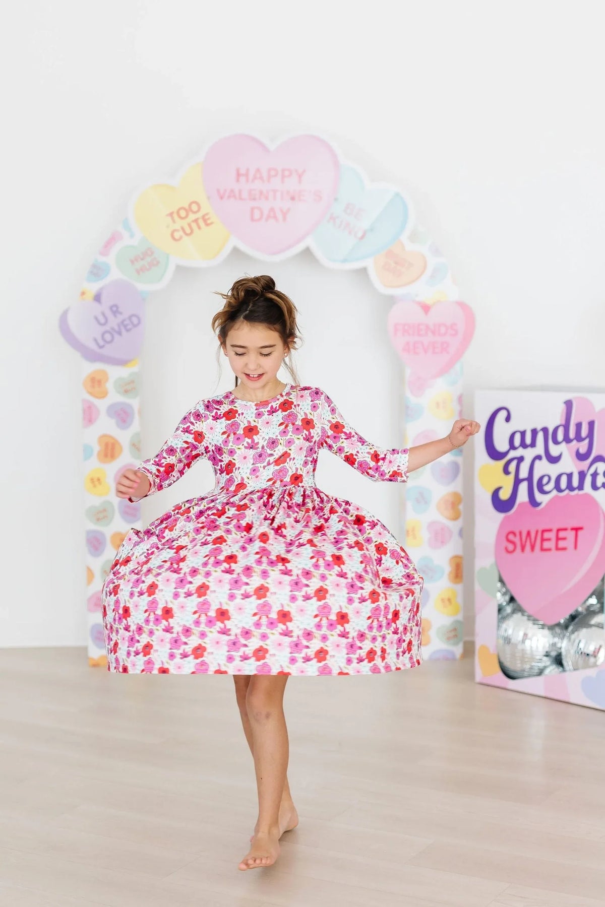 Girls floral twirl dress by Mila & Rose, pink and white with 3/4 sleeves, toddler size