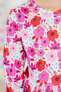 Girls floral twirl dress by Mila & Rose with pink and red flower print, long sleeve, toddler size