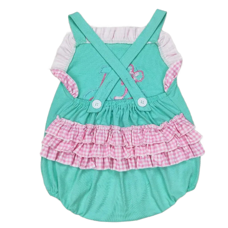 Girls golf swimsuit romper in teal with pink gingham ruffle skirt and cross-back straps for toddlers