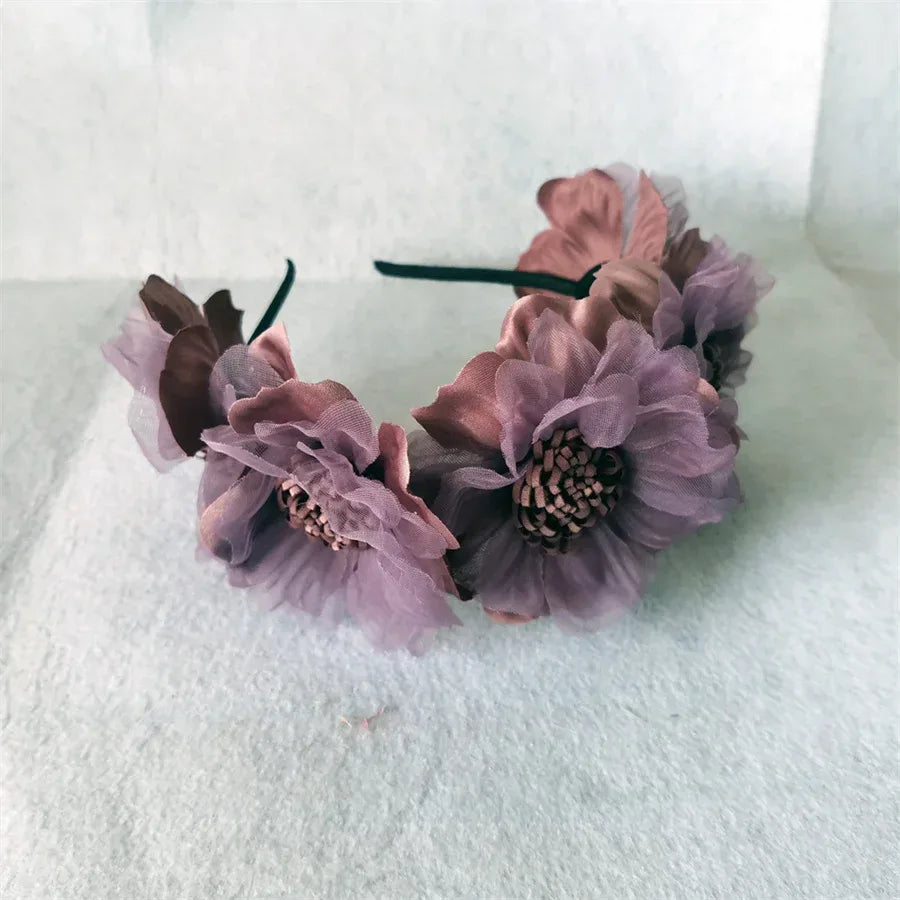 Purple and pink girls headband with large fabric flowers for babies and kids