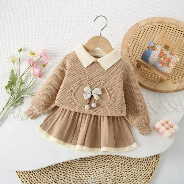 Beige knitted skirt set for girls with white collar and bow detail, suitable for toddlers and young children