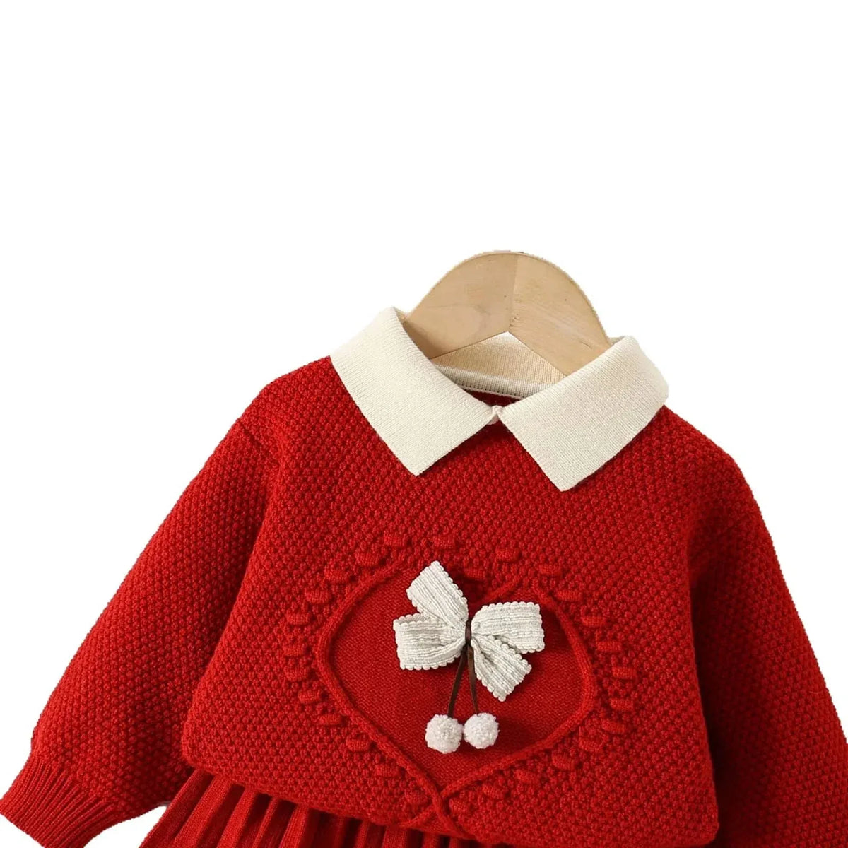 Red knitted skirt set for girls with white collar and bow detail, suitable for toddlers