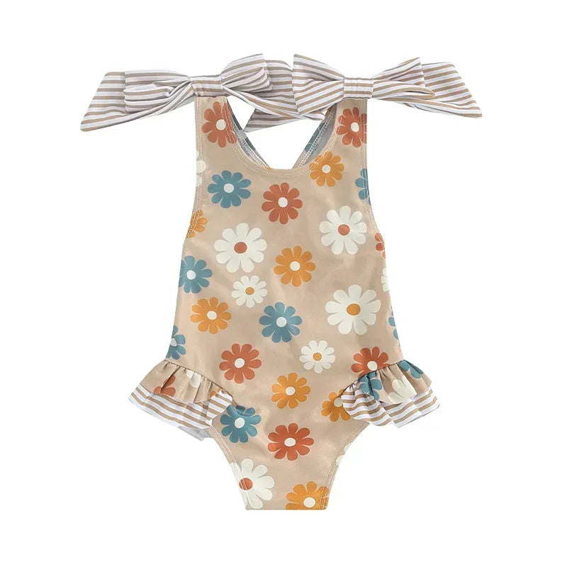 girls one piece swimsuit beige with colorful flower print and striped bow shoulder straps
