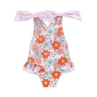 girls one piece swimsuit with floral print in orange blue and pink with pink bow straps for toddlers