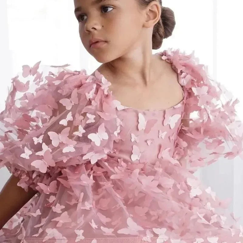Pink girls party dress with 3D butterfly appliques and puff sleeves for toddlers