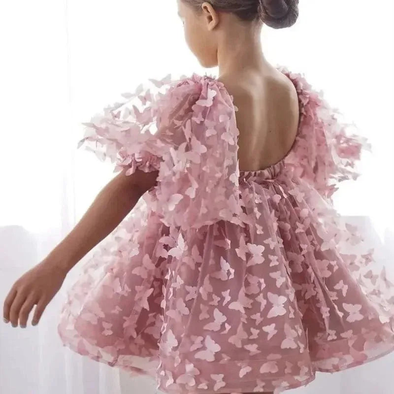 girls pink party dress with butterfly appliques and puff sleeves for toddlers