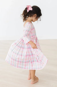 Girls pink plaid twirl dress by Mila & Rose with 3/4 sleeves and pocket detail, toddler size