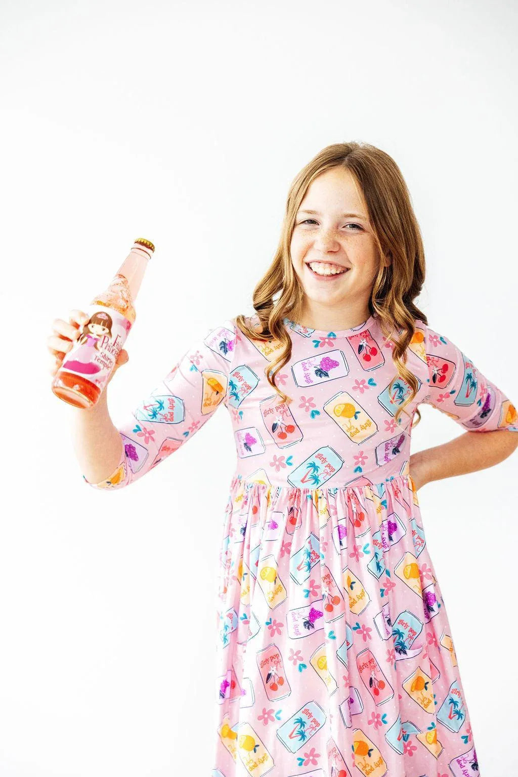 Girls pink twirl dress with 3/4 sleeves and colorful jar print, size for young kids
