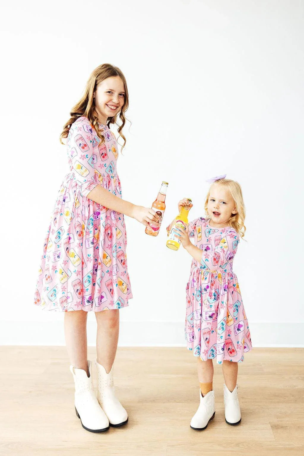 Mila & Rose girls pink twirl dress 3/4 sleeve knee-length for toddlers and kids with colorful pattern