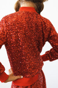 Girls red sequin jacket by Mila & Rose with long sleeves and ribbed cuffs for kids