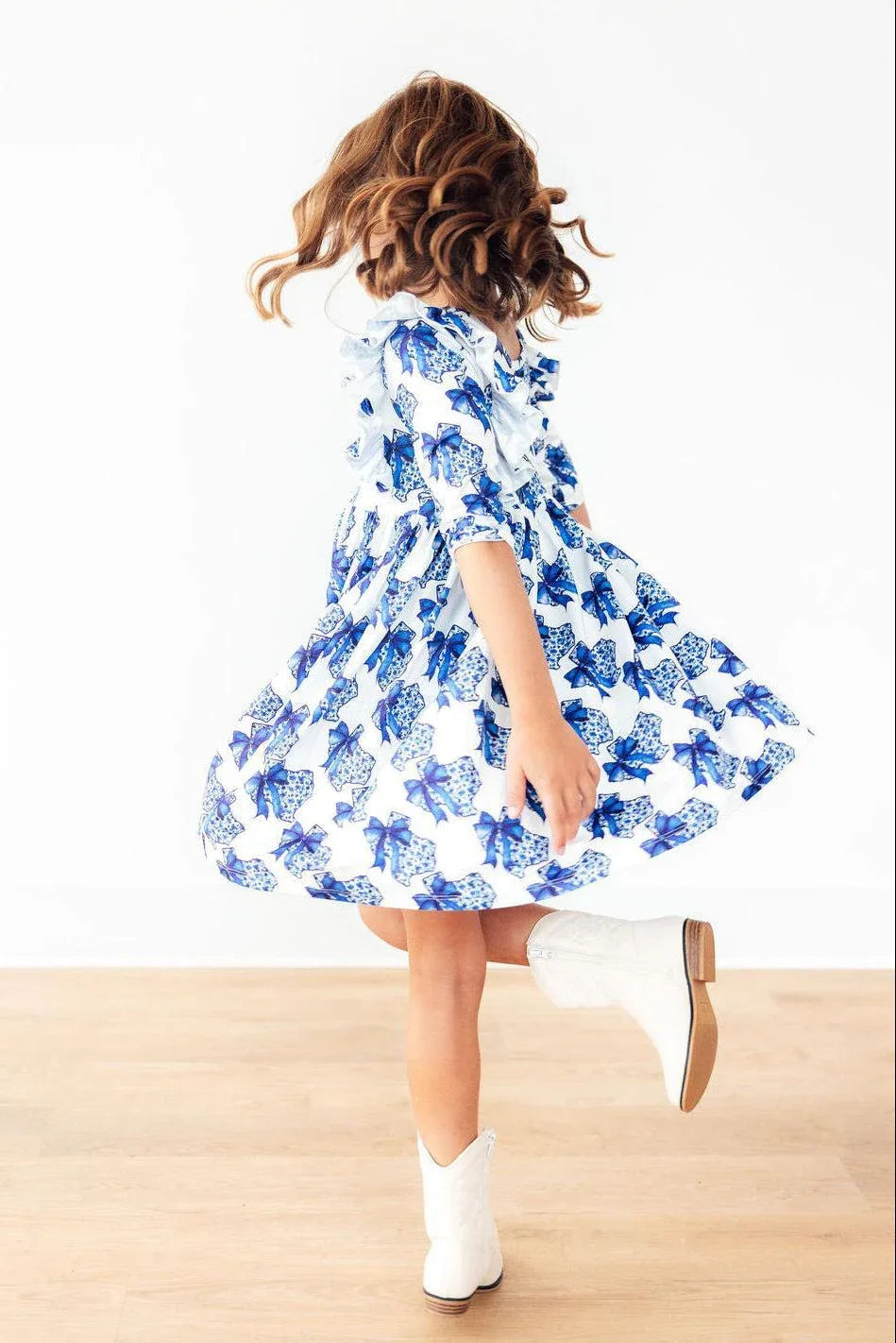 Girls Ruffle Twirl Dress with Blue Bows — The Palm Beach Baby