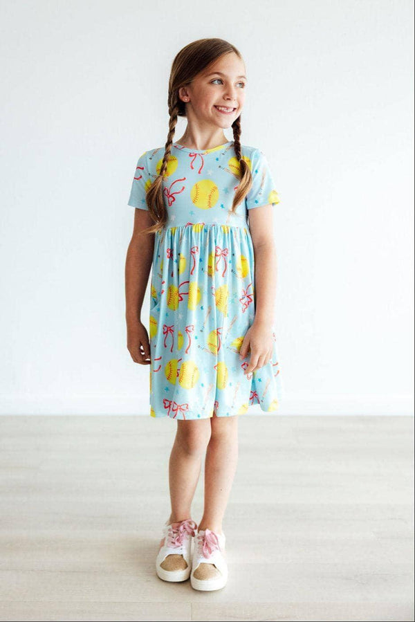 Girls light blue twirl pocket dress with yellow softball print short sleeve girls softball dress