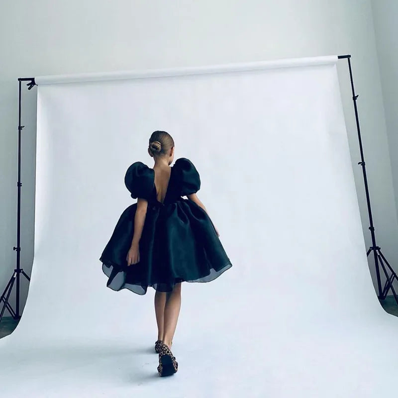 Girls special occasion dress black with puff sleeves and open back for young girls