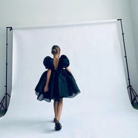 Girls special occasion dress black with puff sleeves and open back for young girls