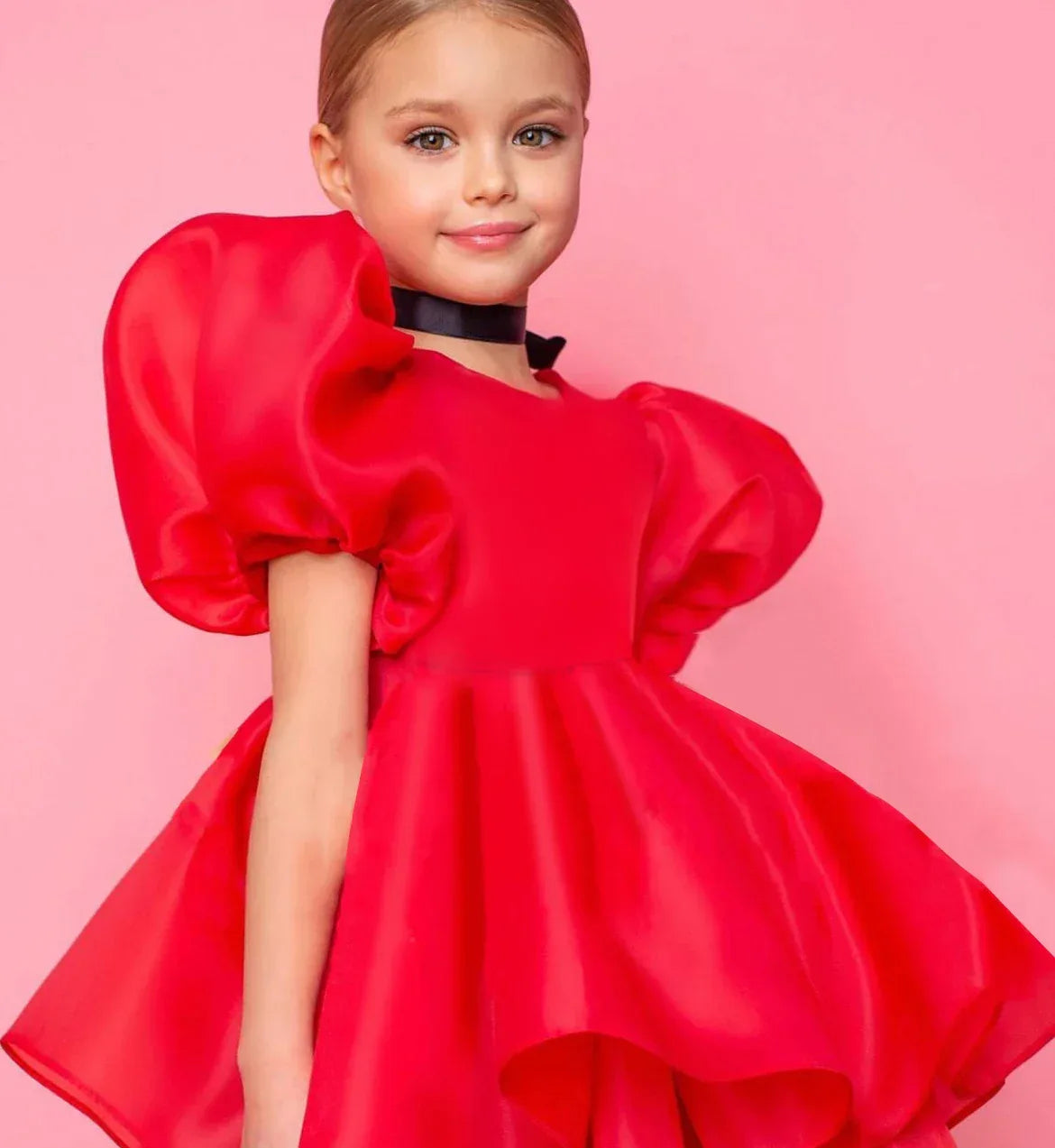 girls special occasion dress in bright red with puffed short sleeves for young girls