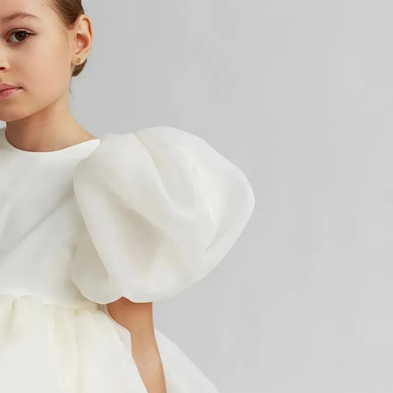 Girls white special occasion dress with oversized puff sleeves for young children