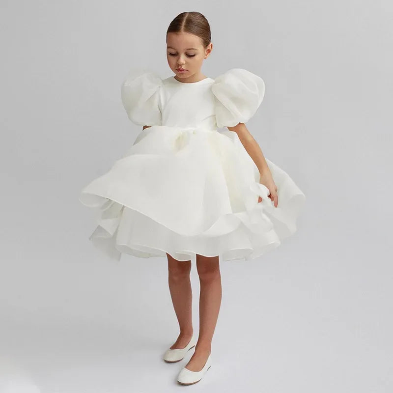 Girls white special occasion dress with puff sleeves and layered skirt for young girls