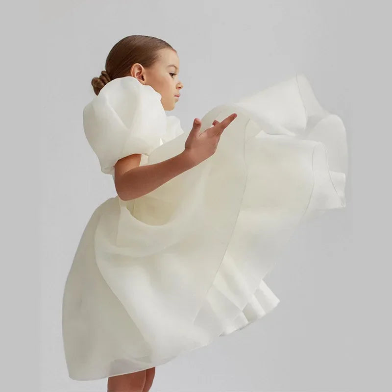 girls special occasion dress in white with puff sleeves and full skirt for toddlers