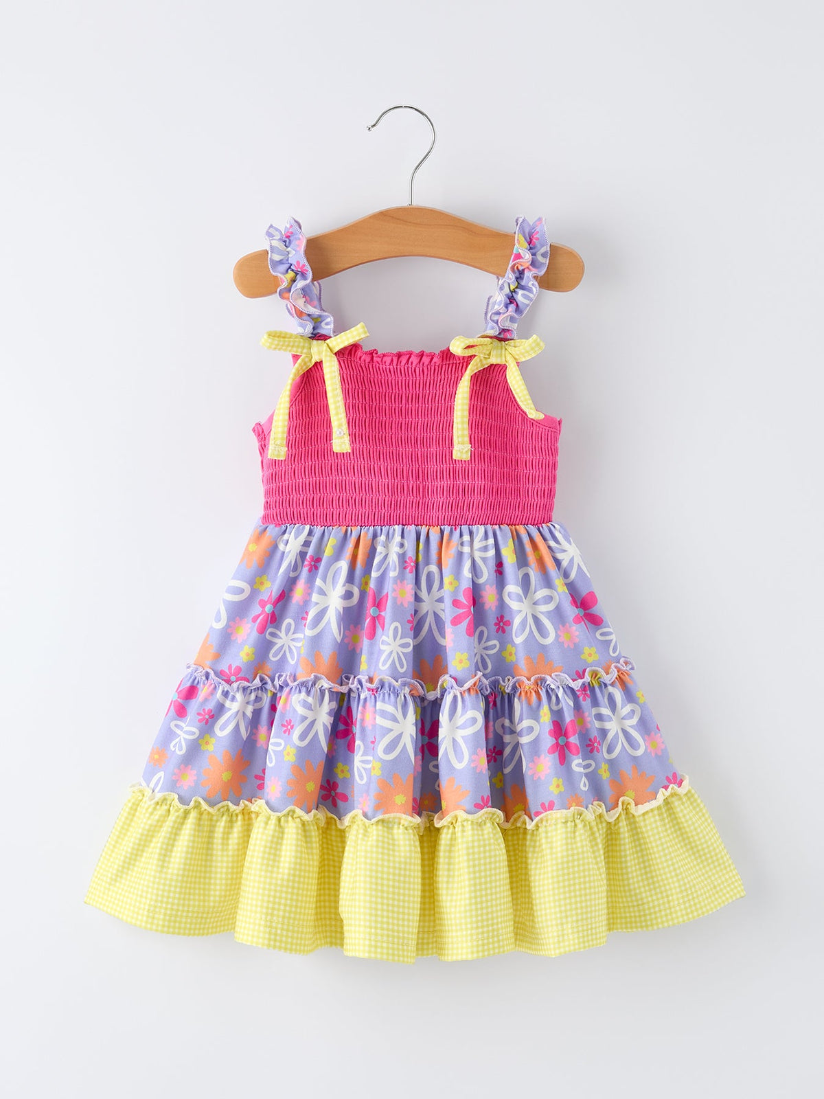 Rylee Faith Designs girls summer floral smocked dress in pink purple and yellow with ruffled straps for young girls