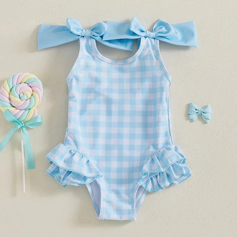 girls swimsuit blue and white checkered pattern with shoulder bows and ruffle details for toddlers