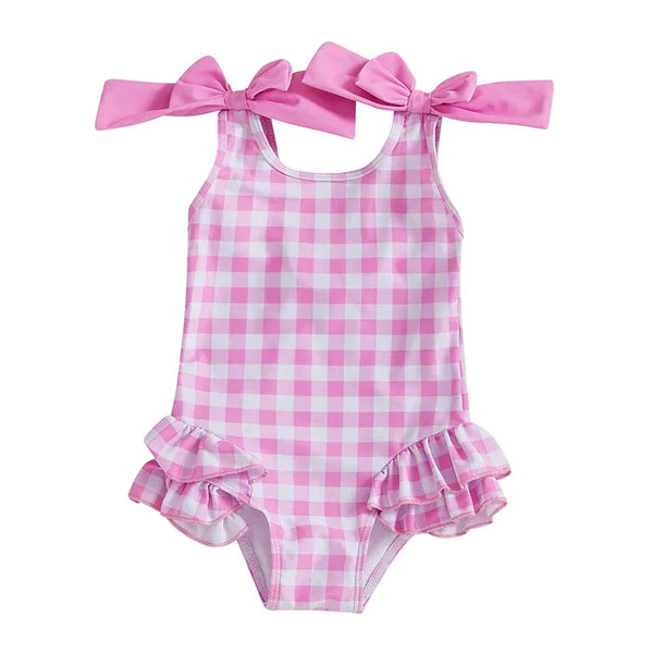 girls pink gingham swimsuit with shoulder bows and ruffle skirt for toddlers