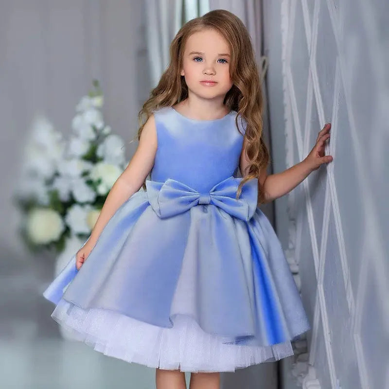 Girls blue tiered party dress for toddlers with large bow and sleeveless design