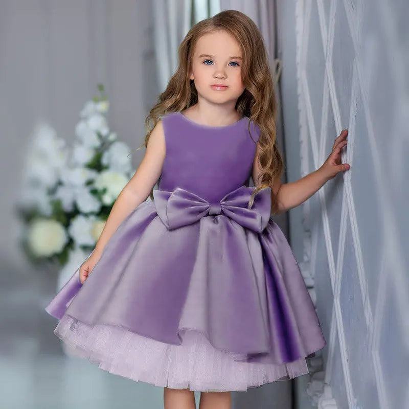 purple girls tiered party dress for toddler with large bow and sleeveless design
