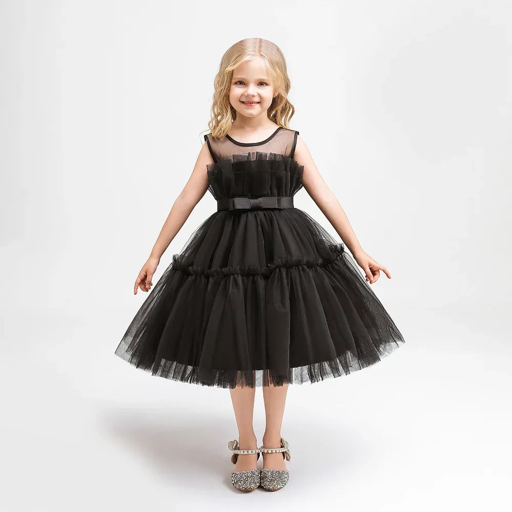 girls black tulle occasion dress with sleeveless design and bow waist detail
