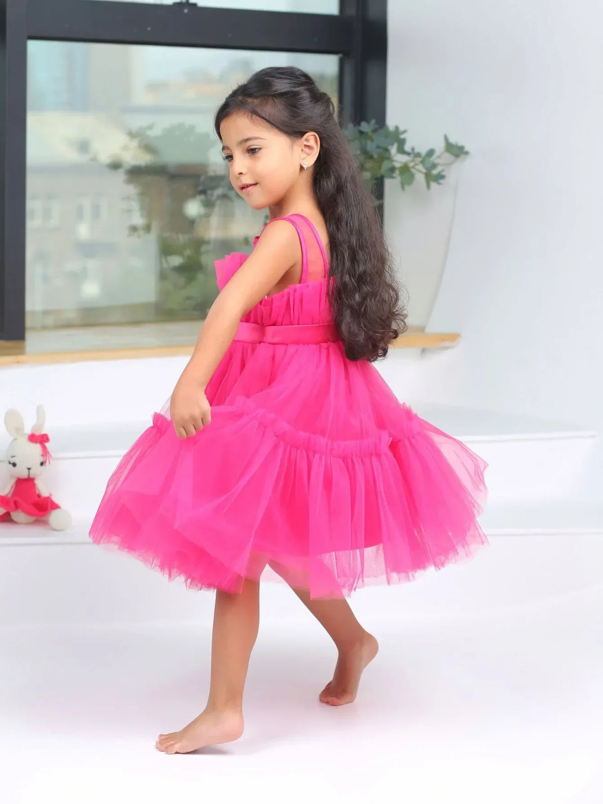 Pink girls tulle occasion dress for toddlers with sleeveless straps and layered skirt