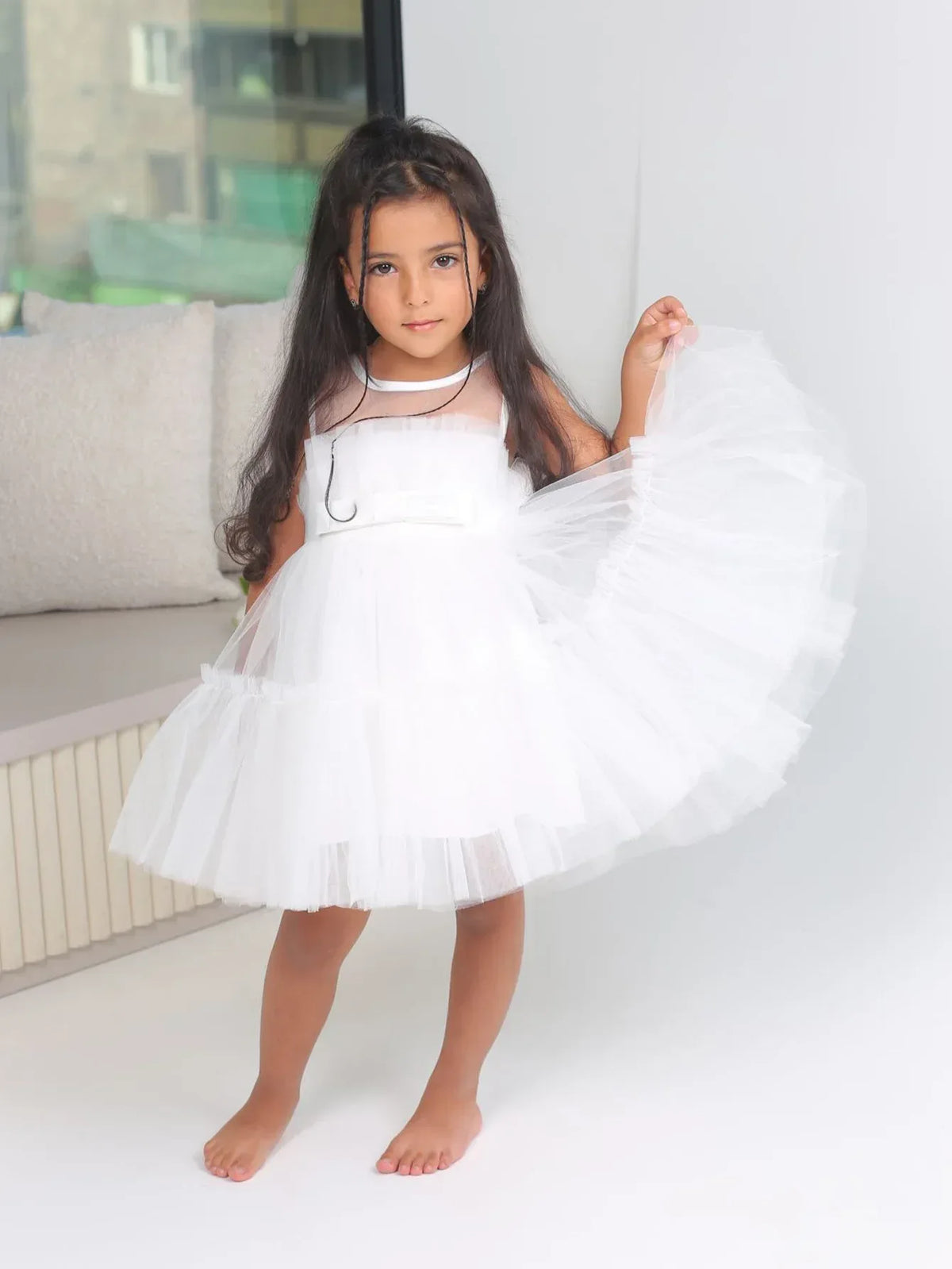White girls tulle occasion dress for toddlers with sleeveless design and layered skirt