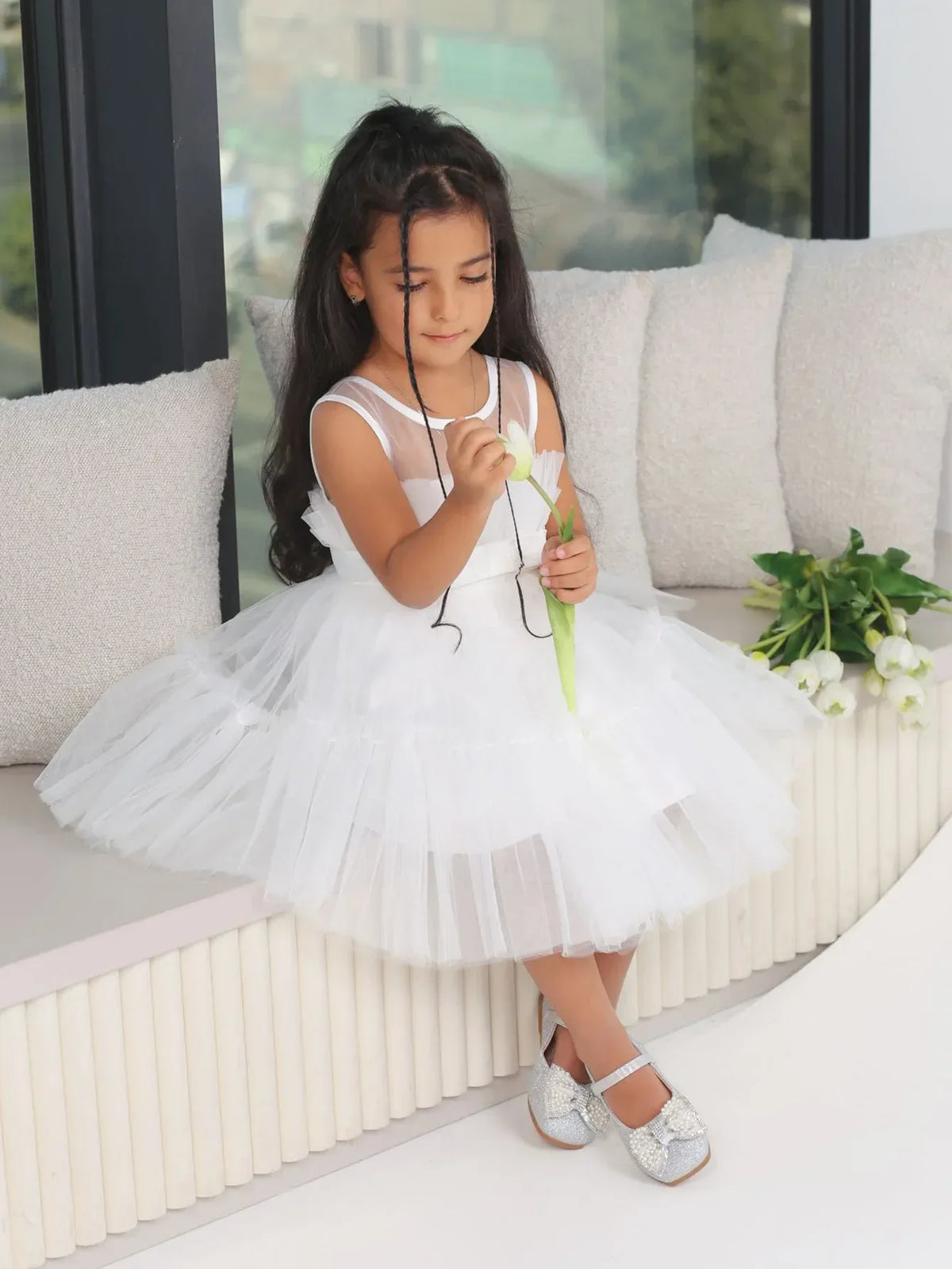 White girls tulle occasion dress for young children with sleeveless design and layered skirt
