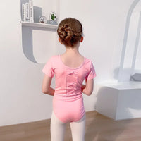 girls pink tutu dress with short sleeves and bow detail on back for toddlers