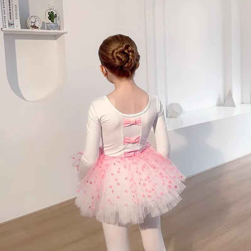 girls tutu dress in white with pink polka dots size for toddlers with long sleeves and bow details