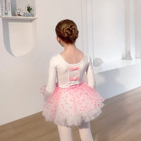 girls tutu dress in white with pink polka dots size for toddlers with long sleeves and bow details